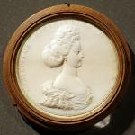 An ivory carving of Christiane Eberhardine of Brandenburg-Bayreuth (1671-1727) by Jean Cavalier, a French artist who worked at many European courts.