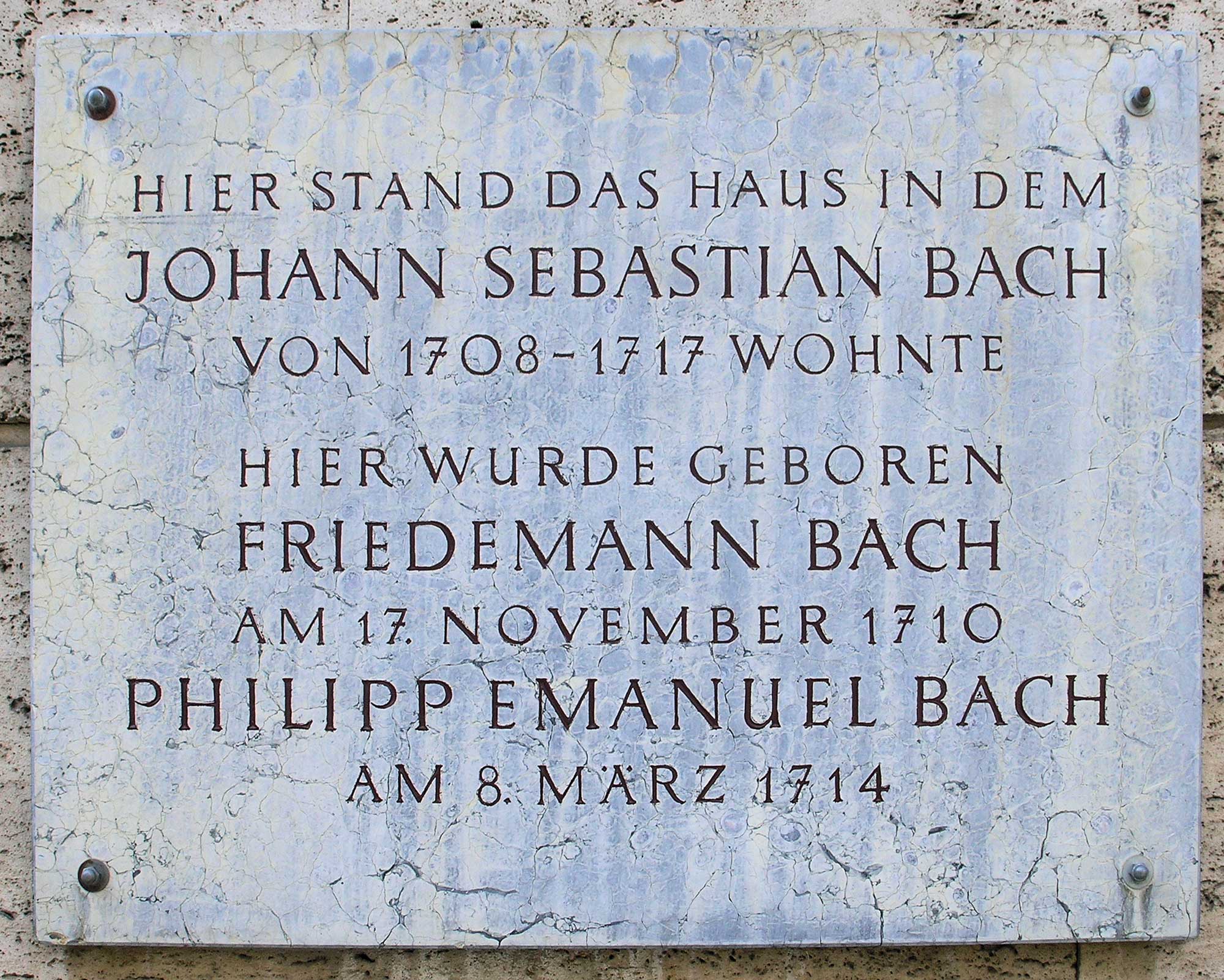 Remembrance plaque marking the spot where Bach's house stood in Weimar. That location is now... a parking lot.